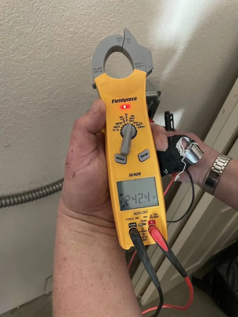 Voltage testing with clamp meter during Recessed Lighting Installation in Seven Hills